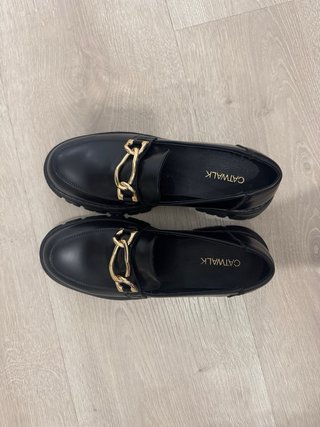 Mocasines negros de la marca Catwalk