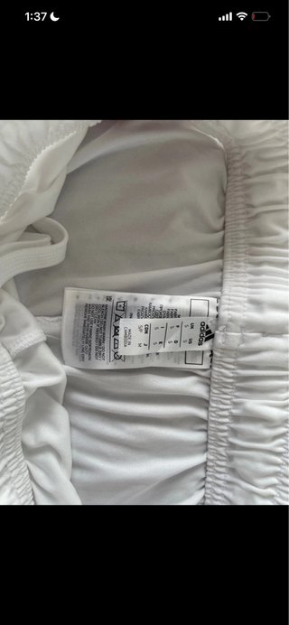Pantalon corto.