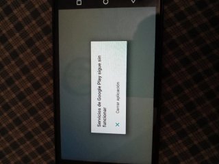 Móvil Motorola gris.