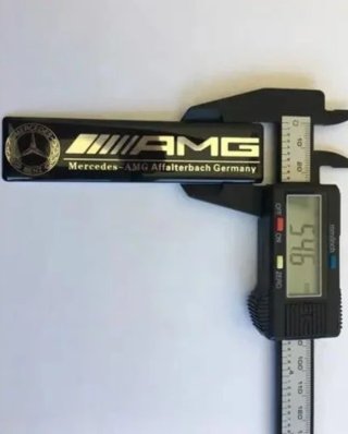 EMBLEMA AMG NEGRO SILICONA MERCEDES LOGO INTERIOR
