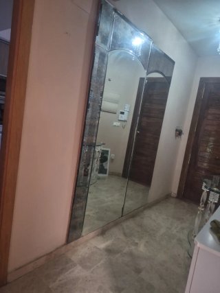 espejo grande  y 2  cubreradiadores. En cristal