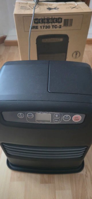 Estufa de parafina negra