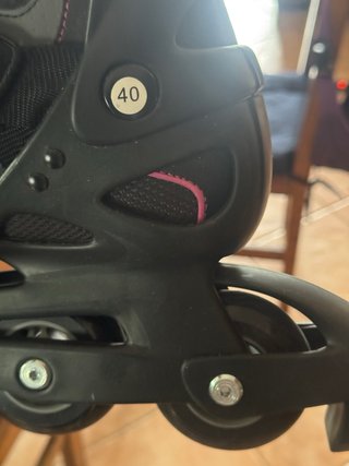 Pattini in linea Oxelo neri e rosa