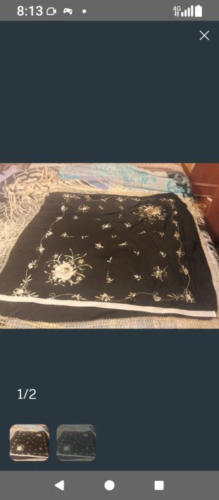 Mantón español bordado negro y dorado