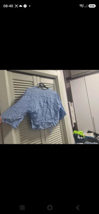 Camicetta con nodo azzurra in viscosa
