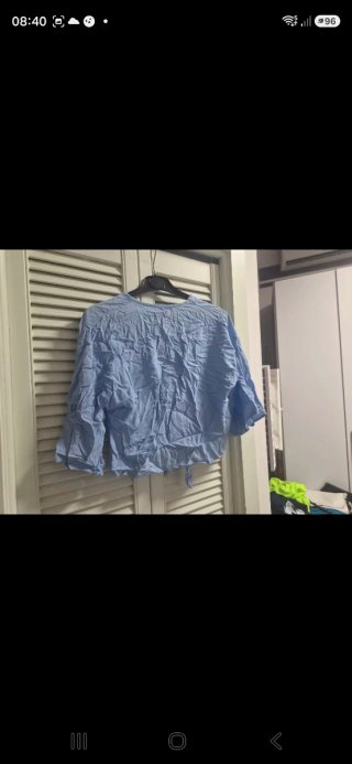 Camicetta con nodo azzurra in viscosa