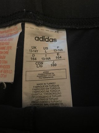 Mallas Adidas grises y negras