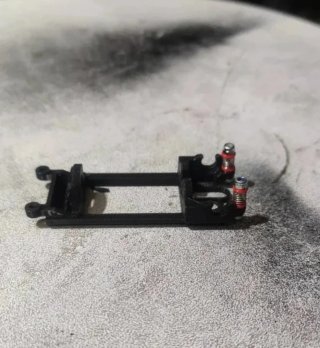 Cuna o soporte motor en linea apta para suspension
