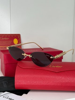 Gafas de sol Cartier doradas y marrones