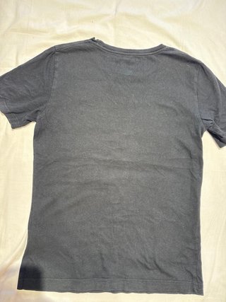 Camiseta Jordan Negra y Morada talla L niños