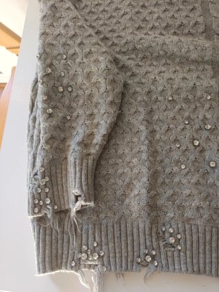 Jersey gris trenzado