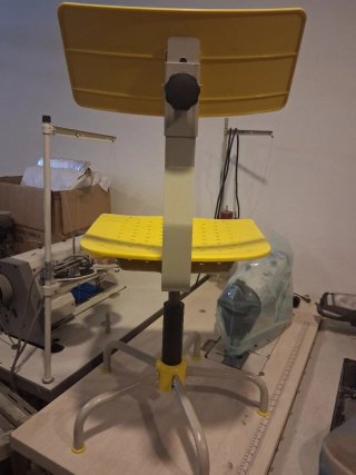 Silla de operaria de maquina de coser