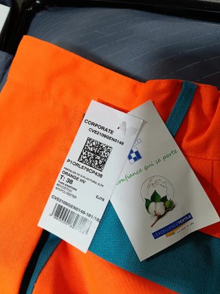 Pantalón de trabajo naranja y turquesa