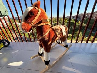 Caballito balancín infantil