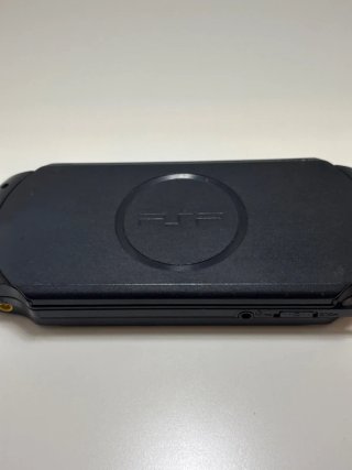 PSP Street E1004 Nera + Caricatore + 9 Giochi