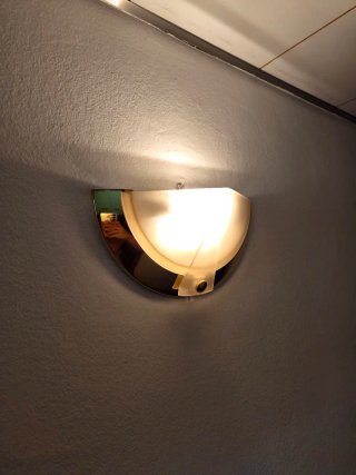 Aplique de pared dorado y transparente