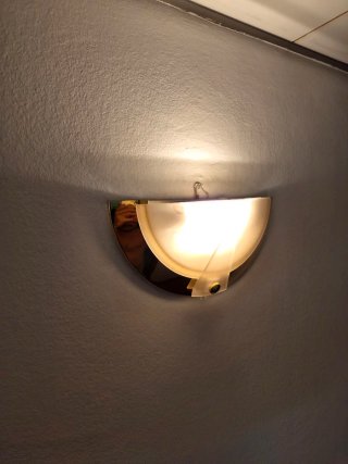 Aplique de pared dorado y transparente