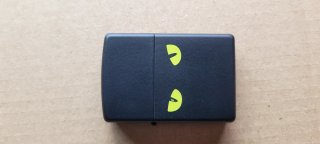 Zippo Negro Ojos Verdes (LEER)