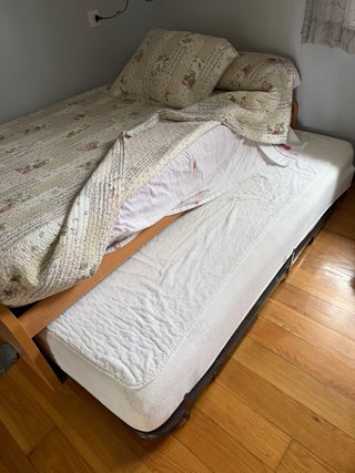 Cama nido de madera y tela
