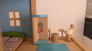 Casita de muñecas de madera