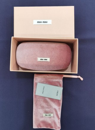 Gafas de sol Miu Miu doradas Como nuevas