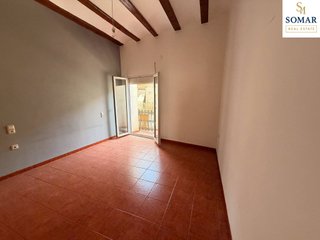 Casa de pueblo con nave anexa y terreno rústico