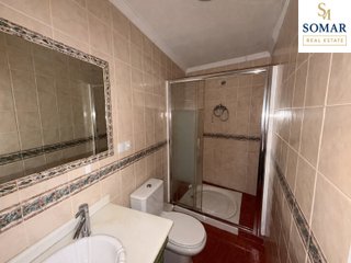 Casa de pueblo con nave anexa y terreno rústico