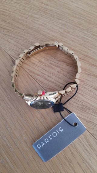 Reloj Parfois dorado con esfera verde