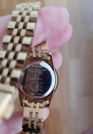 Reloj Parfois dorado con esfera verde