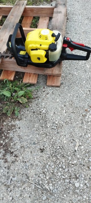 Cortasetos de gasolina amarillo