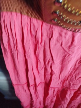 Falda larga coral con cinturón