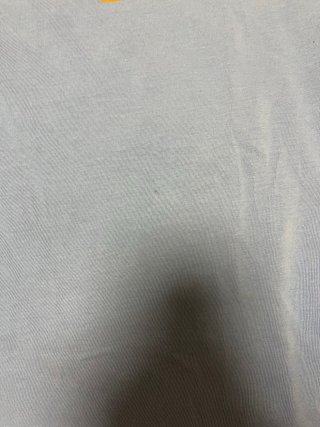 Camiseta El Niño azul y naranja