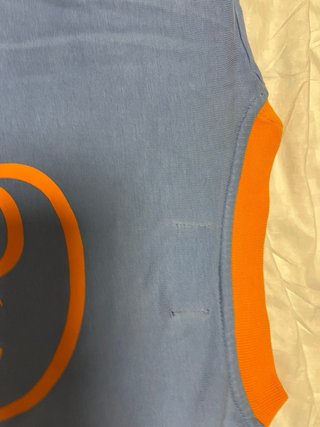 Camiseta El Niño azul y naranja