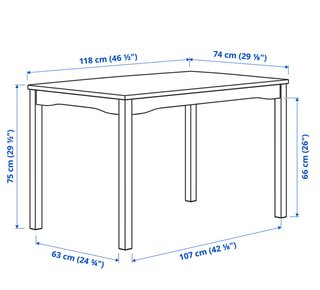 Mesa y 4 sillas blancas