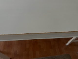 Mesa y 4 sillas blancas