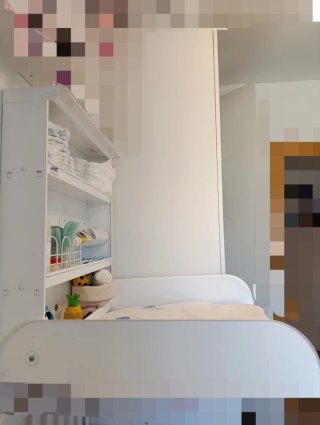 Cambiador de pared plegable