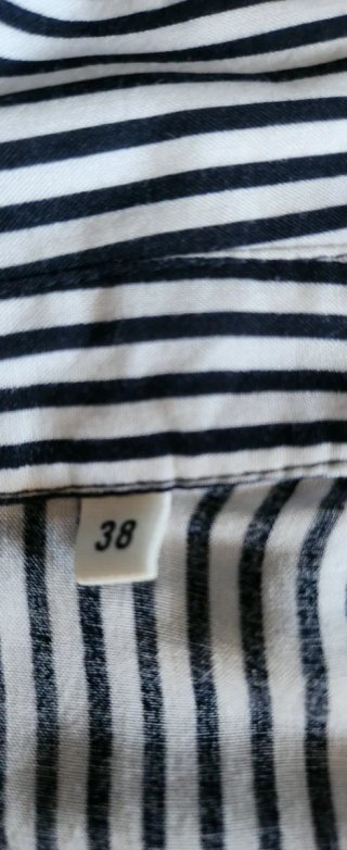 Blusa Naf Naf rayas negra y blanca. Talla 38.