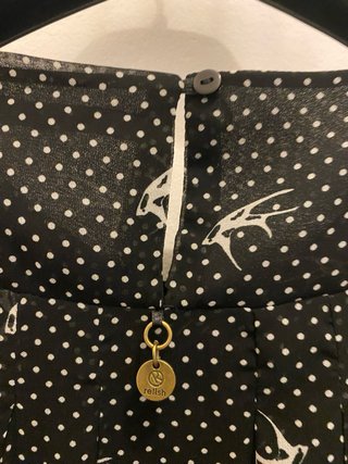 Vestito nero con pois e uccellini