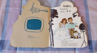 Libro infantil. Nora locutora de TV.