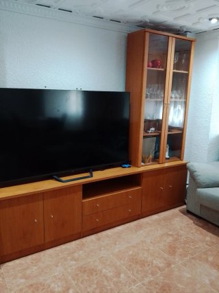 Mueble de salón madera y cristal