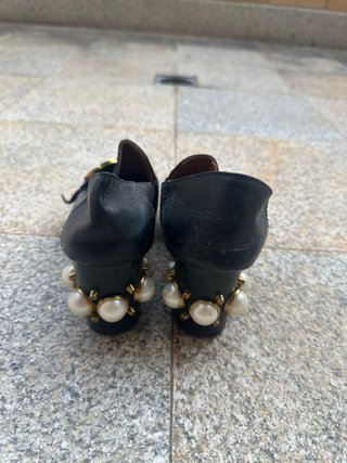 Scarpe Gucci nere con logo GG