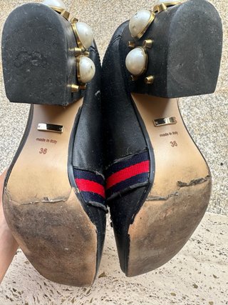 Scarpe Gucci nere con logo GG
