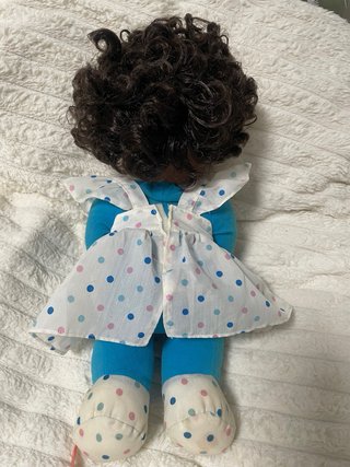 Muñeca musical antigua de famosa