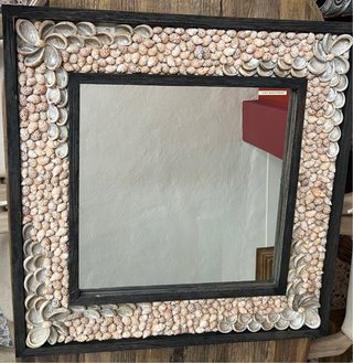 Espejo decorado con conchas marinas