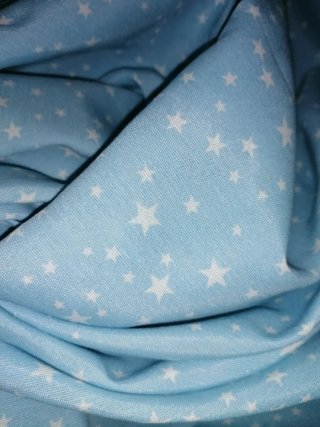 Scampolo tessuto azzurro con stelle bianche