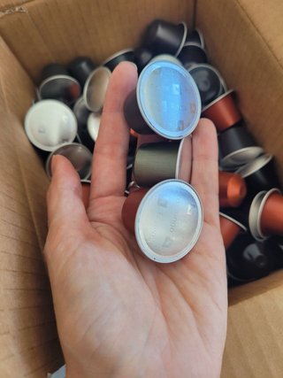 Cafetera+300 capsulas originales- Nespreso DeLongh