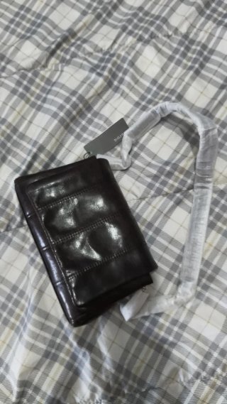bolso bandolera marrón.