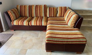 Divano letto con penisola sfoderabile
