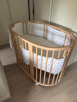 Cuna Stokke ovalada madera