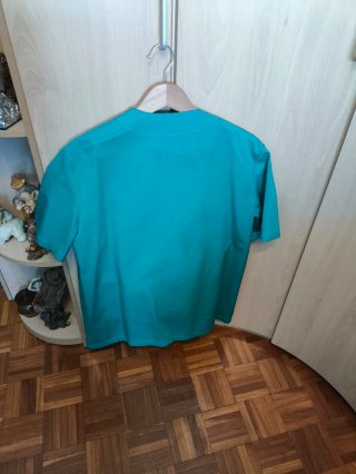 Chaqueta de trabajo y pantalón verde